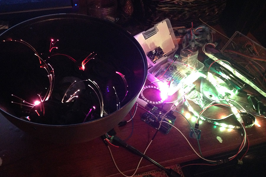 scrying mirror miniature with lit LED strips being tested