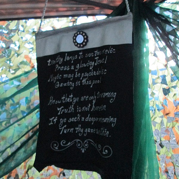 scrying mirror scroll with instructions for visitors